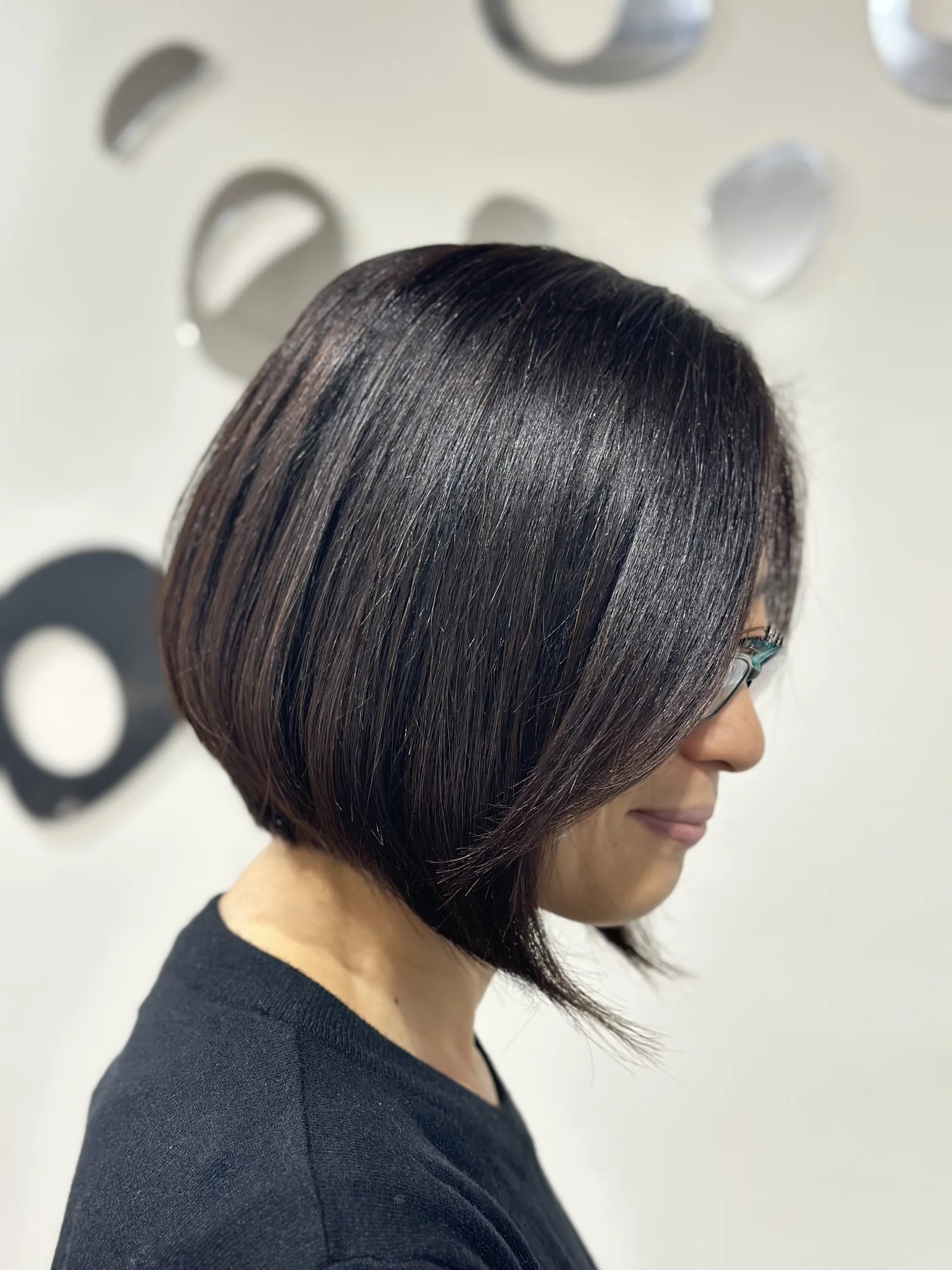 Dark sleek angled bob, Japanese precision