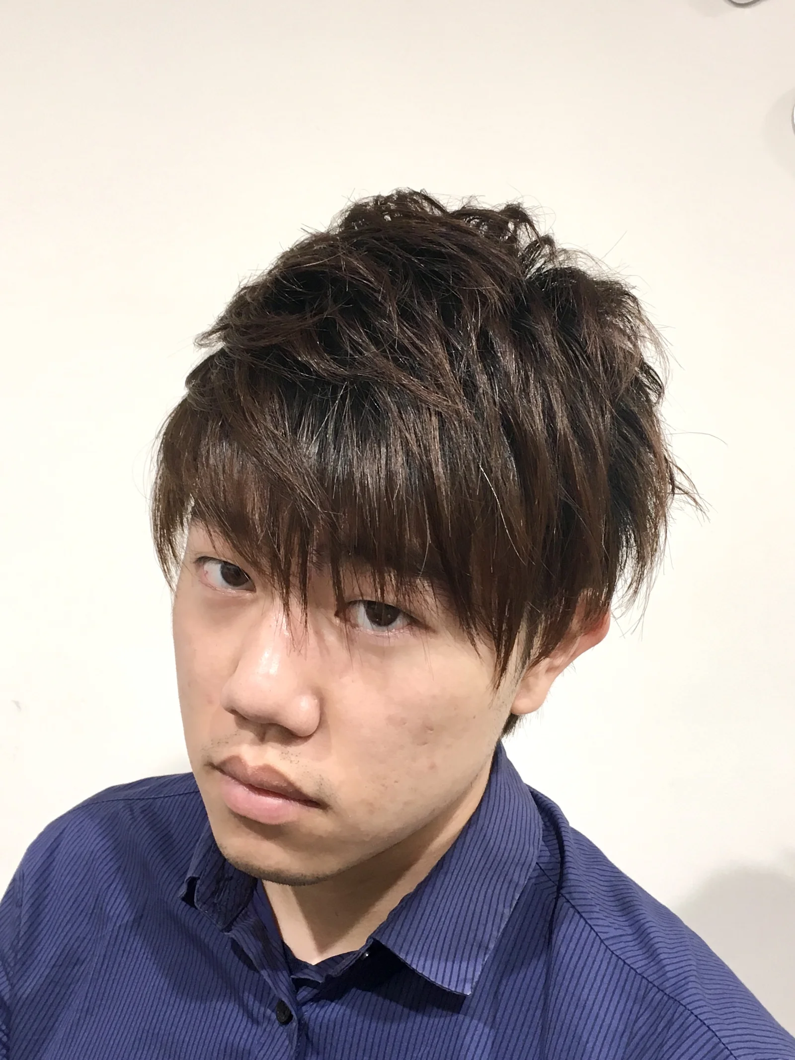 Men's dark brown textured fringe shag cut