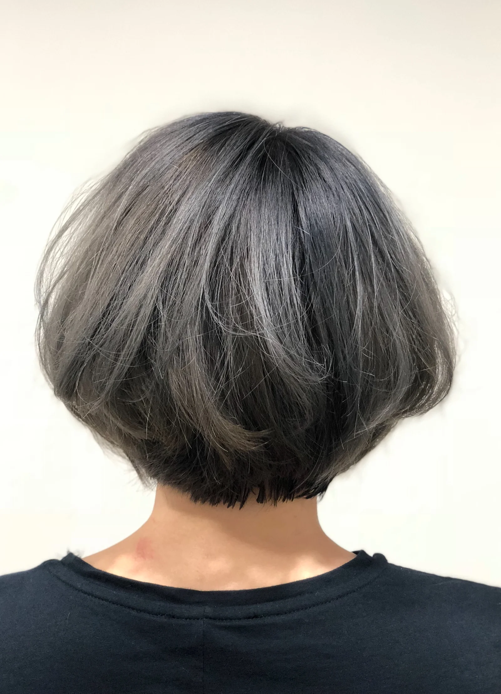 Dark steel-grey short bob